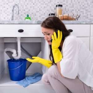 Woman with a Plumbing Emergency